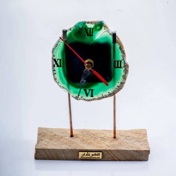 The clock on the table is agate